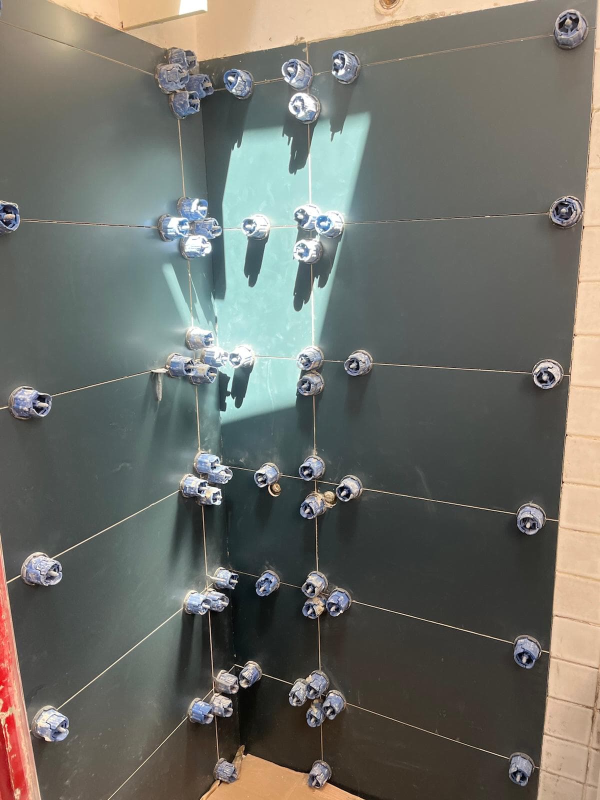 Rénovation d'une douche avec receveur et faïence à Paris (photo 1 sur 2)